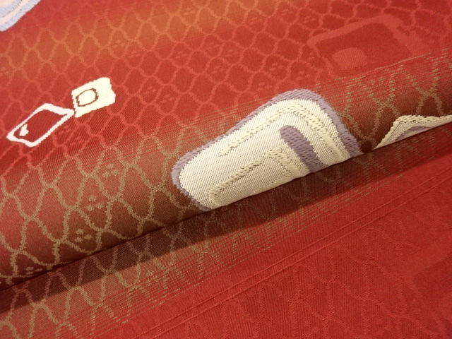  色紙散らし模様織出し名古屋帯